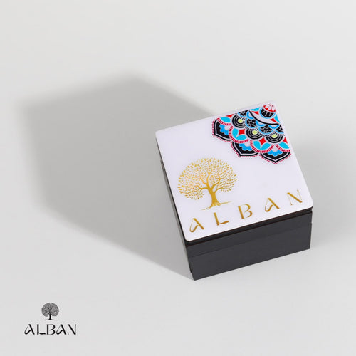 Green soap bar box with tree design in a black box labeled 'Alban' on a white background